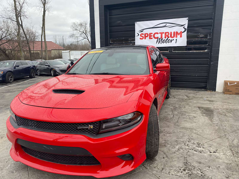 🌟Embrace Unmatched Performance and Style with the Iconic Red Dodge Charger at Spectrum Motor 1🌟