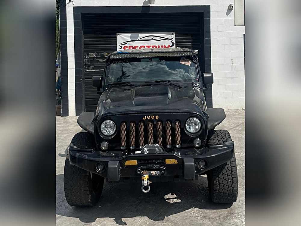 A Day With the 2014 Jeep Wrangler Unlimited 4WD 4dr Sport A Day With the 2014 Jeep Wrangler Unlimited 4WD 4dr Sport