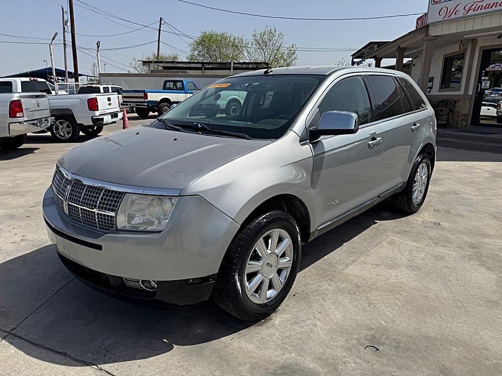Battle of the SUVs: 2007 LINCOLN MKX vs. 2012 JEEP GRAND CHEROKEE LAREDO