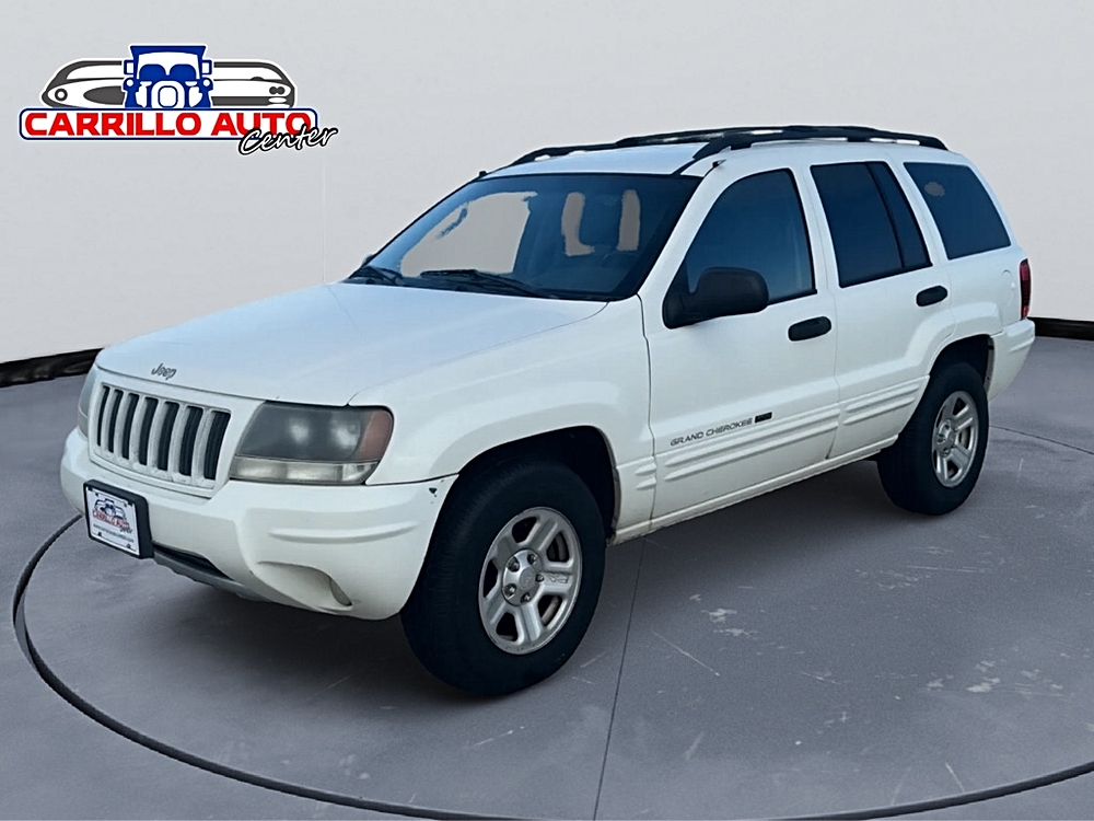 🚘 Take the Wheel of Possibility: 2004 JEEP GRAND CHEROKEE LAREDO