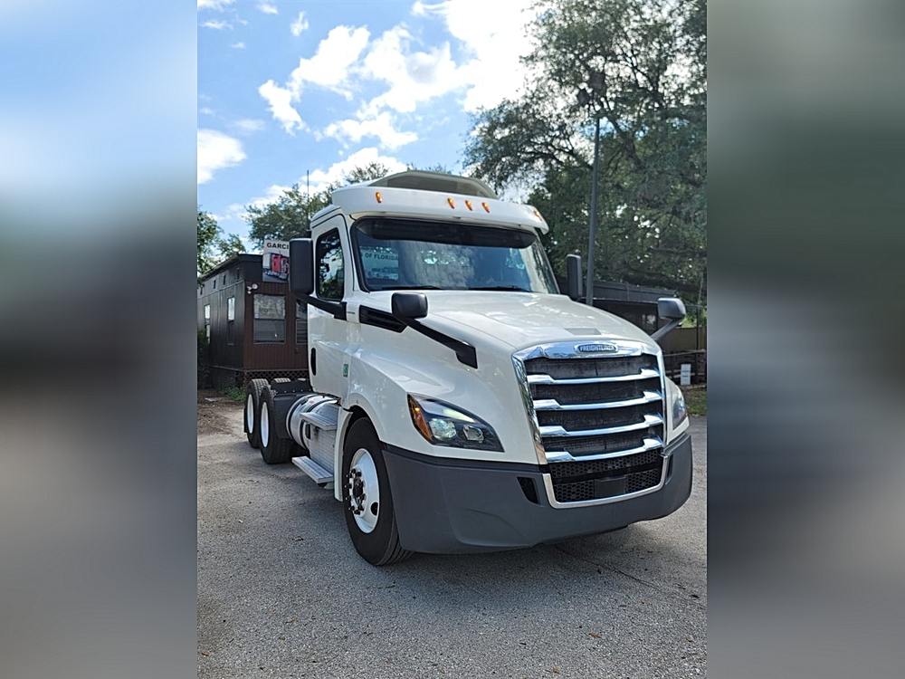Comparing Giants: A Review of Three Top Used Daycab Trucks