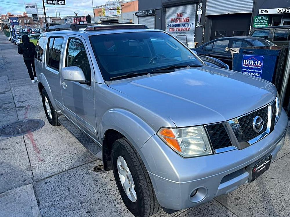 “Affordable Adventures: Comparing the 2006 Nissan Pathfinder LE 4WD and the 2008 Honda Odyssey EX”