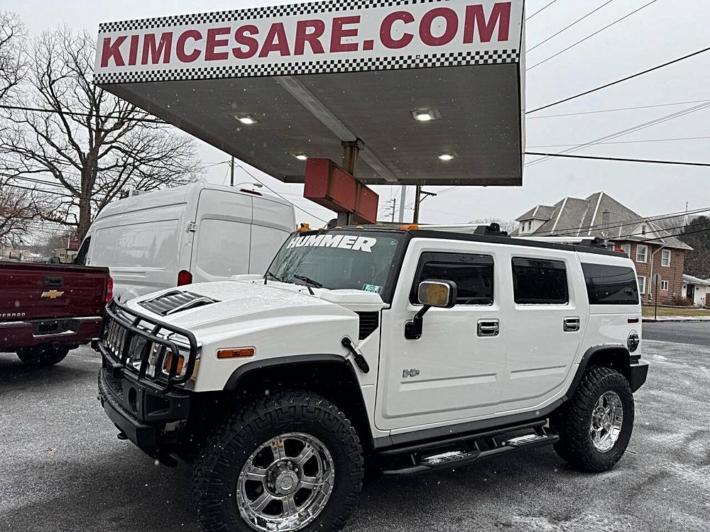 Rugged Adventures on a Budget: Comparing the 2003 HUMMER H2 and 2016 Chevy Silverado Work Truck