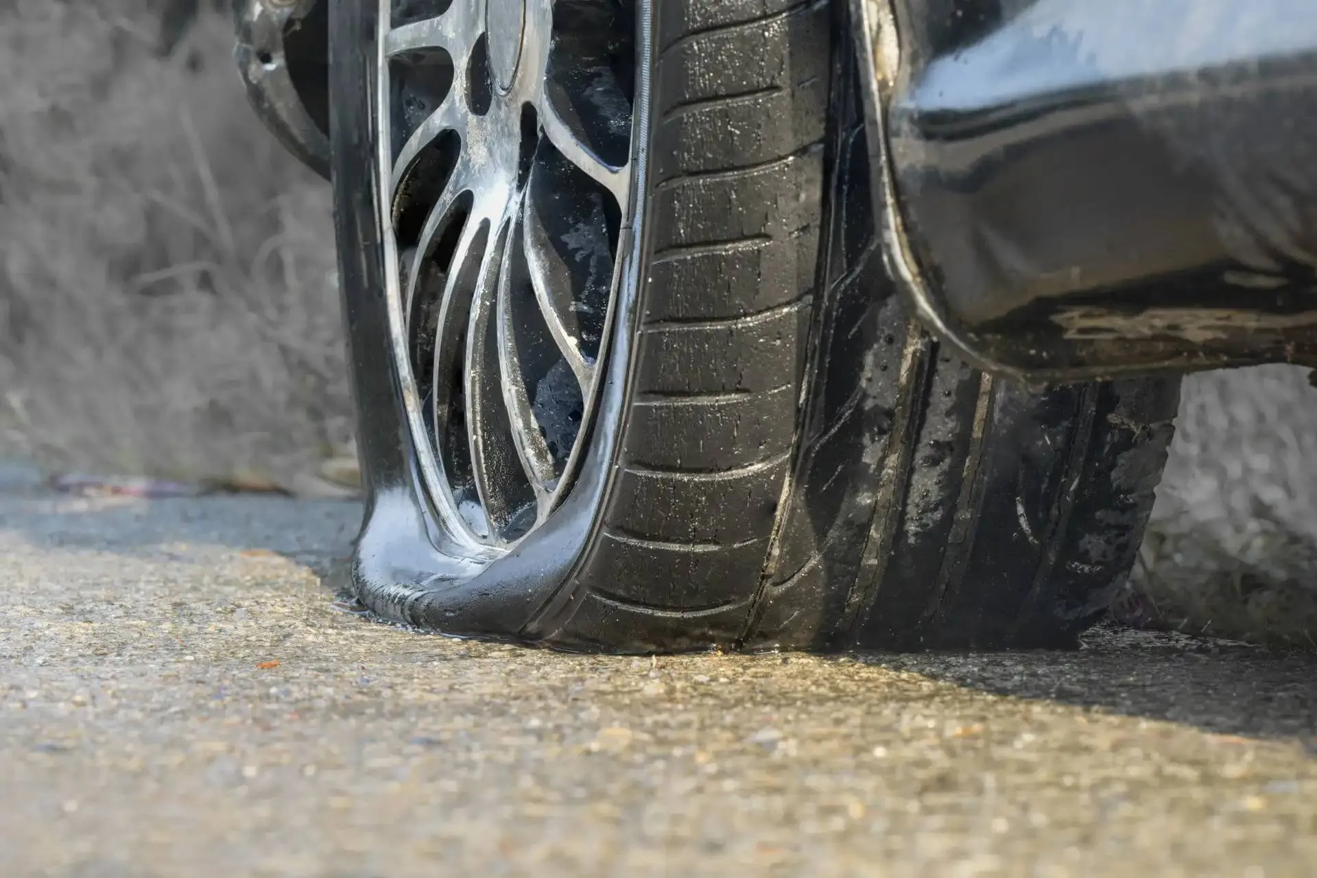 Flat tire on road — NitroFill coverage