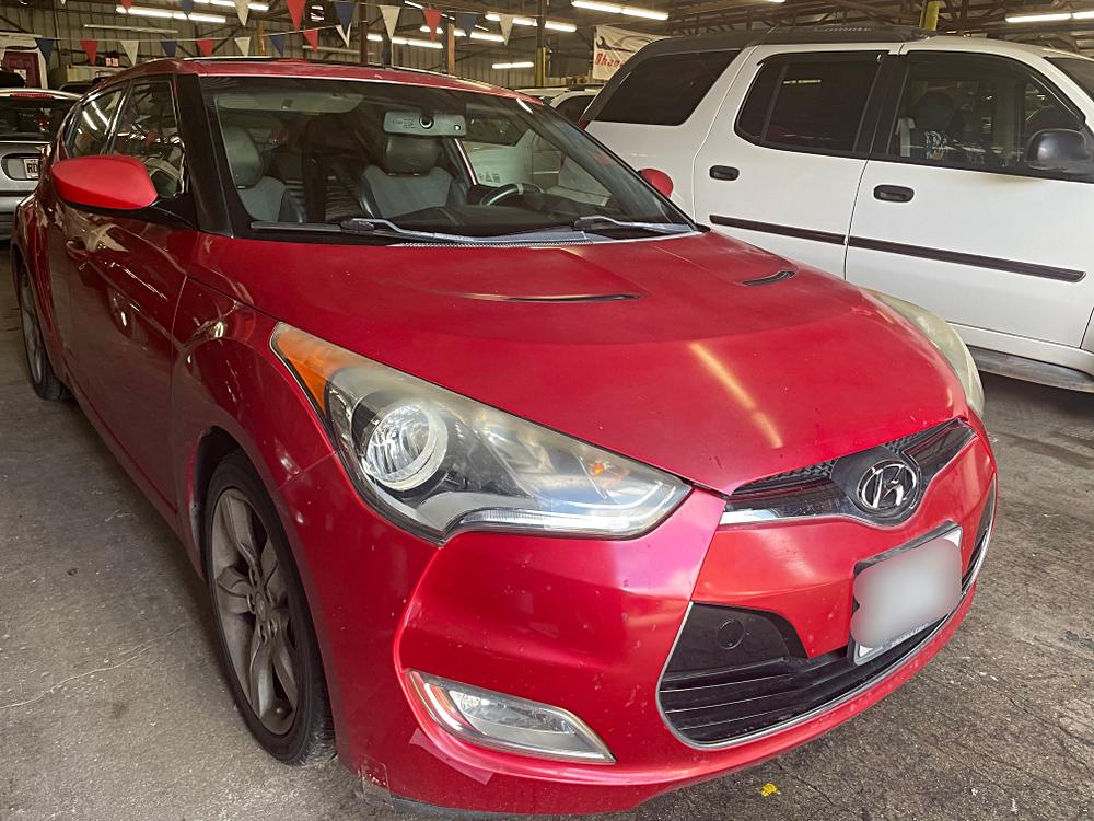 🚗 Discover the 2014 Hyundai Veloster: A Compact Powerhouse in Red 🌟