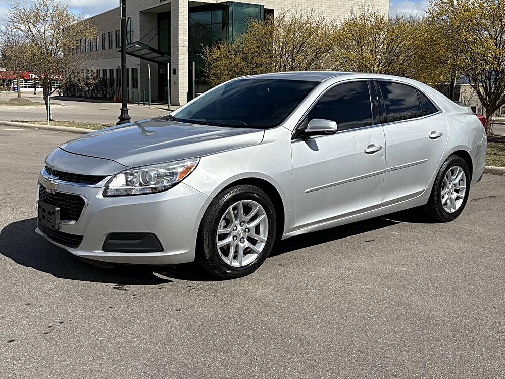 “Driving Into the Details: 2014 Chevrolet Malibu LT vs Two Sedans in Our Inventory”
