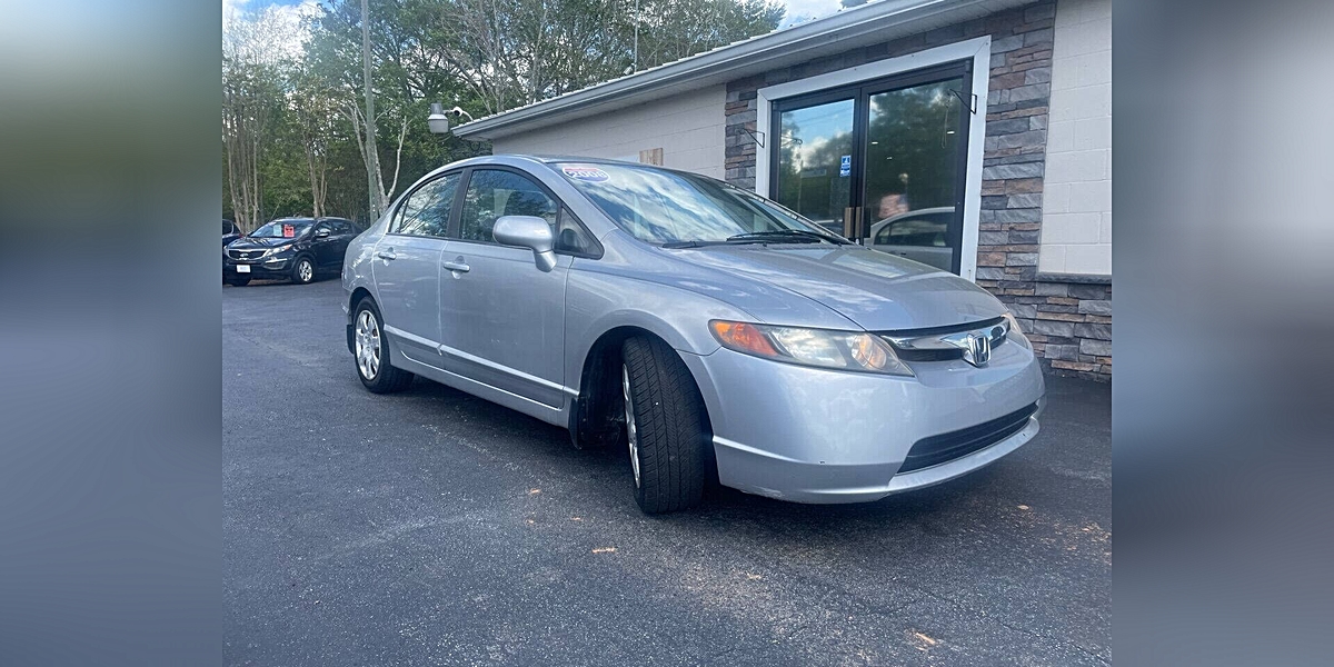 Battle of the Best: A Comparison of 2008 Honda Civic LX, 2006 Kia Sedona LX, and [Third Vehicle]