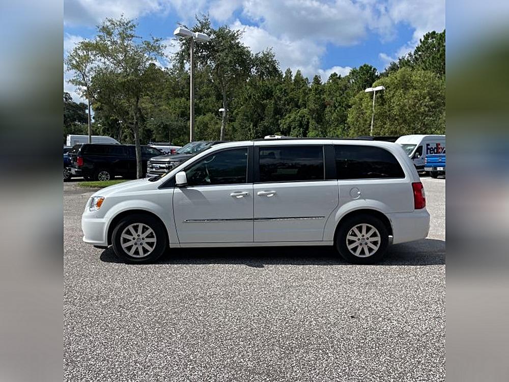 Battle of the Chrysler Classics: A Comparison of the 2014 Town & Country, 2010 Town & Country, and 2009 Chrysler 300