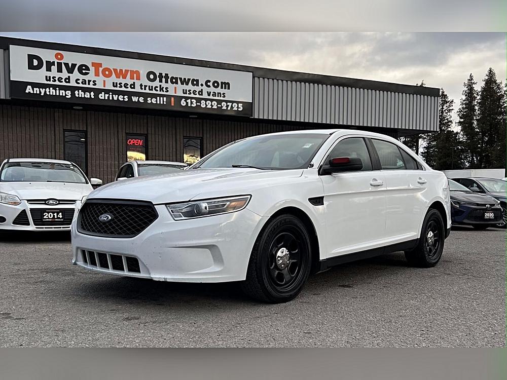 “From Duty to Beast: Comparing Three White Titans of the Road – 2019 Ford Police Interceptor, 2019 Nissan NV200, and 2003 Ford F-650 XLT”