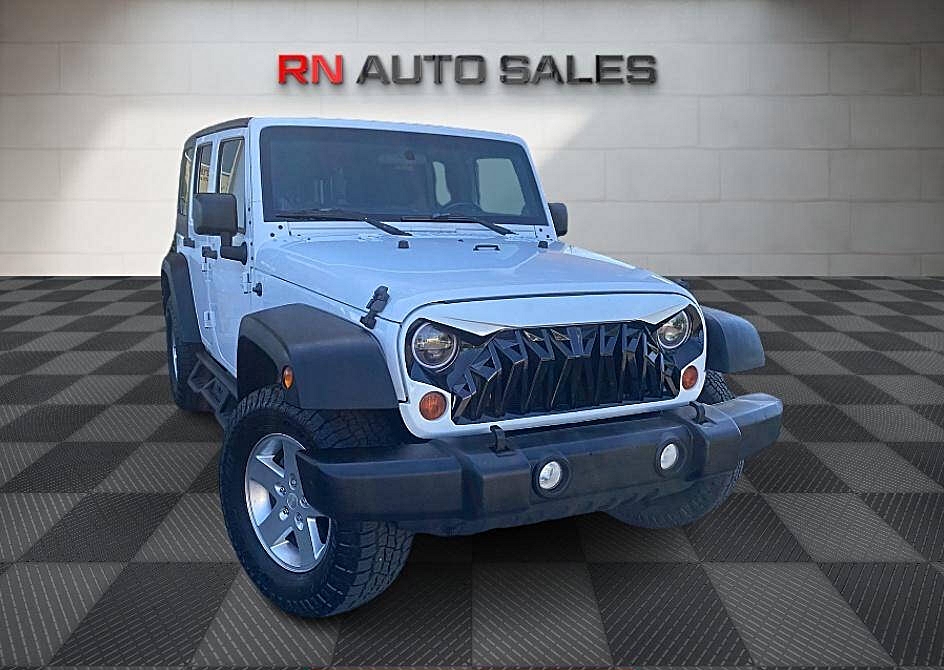 “Affordable Adventure: Comparing the 2012 Jeep Wrangler Unlimited, 2011 Toyota Sienna, and 2018 Nissan Altima”