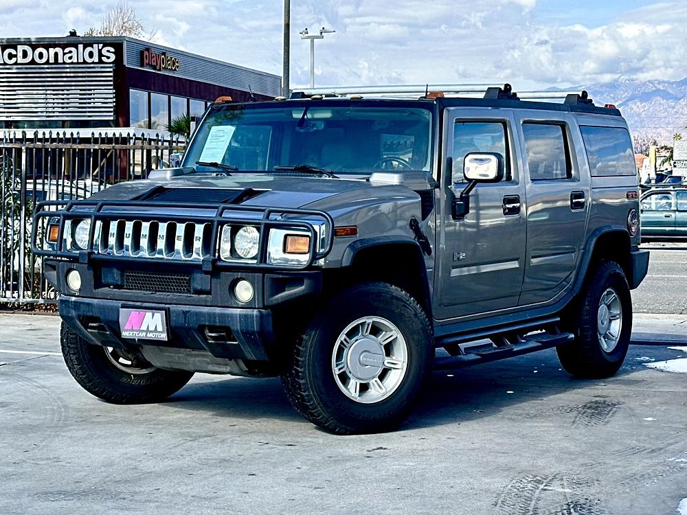 Grit or Grandeur? The 2003 Hummer H2 and 2014 Maserati Quattroporte Face Off