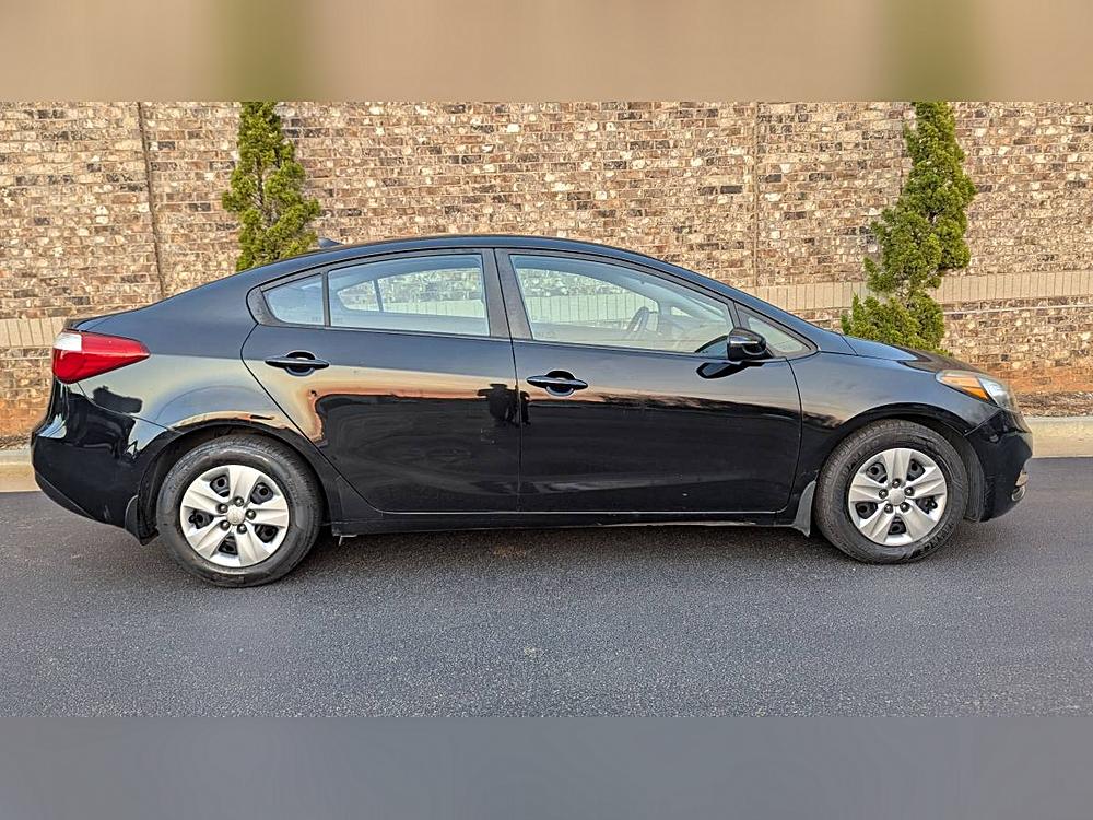 The Ultimate Kia Vehicle Showdown: 2015 Kia Forte LX vs 2012 Kia Sedona LX