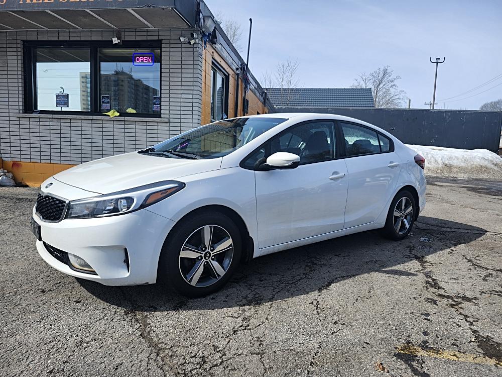 Pre-Owned Vehicle Spotlight: A Comparative Look at Kia Forte, Ford Taurus, and Hyundai Sonata