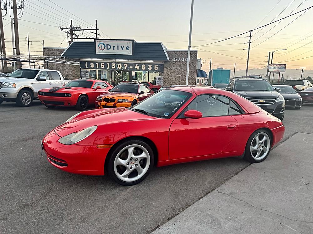 Discover the 1999 Porsche 911 Convertible in Dazzling Red!