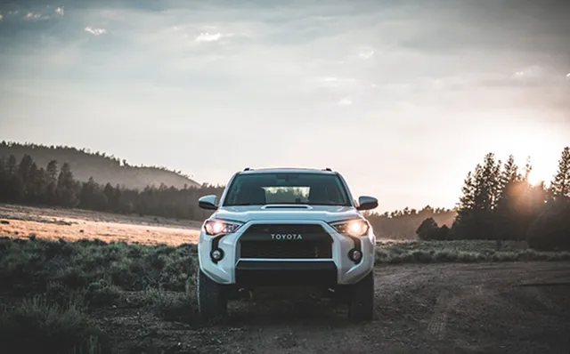 Toyota 4Runner in the field at sunset